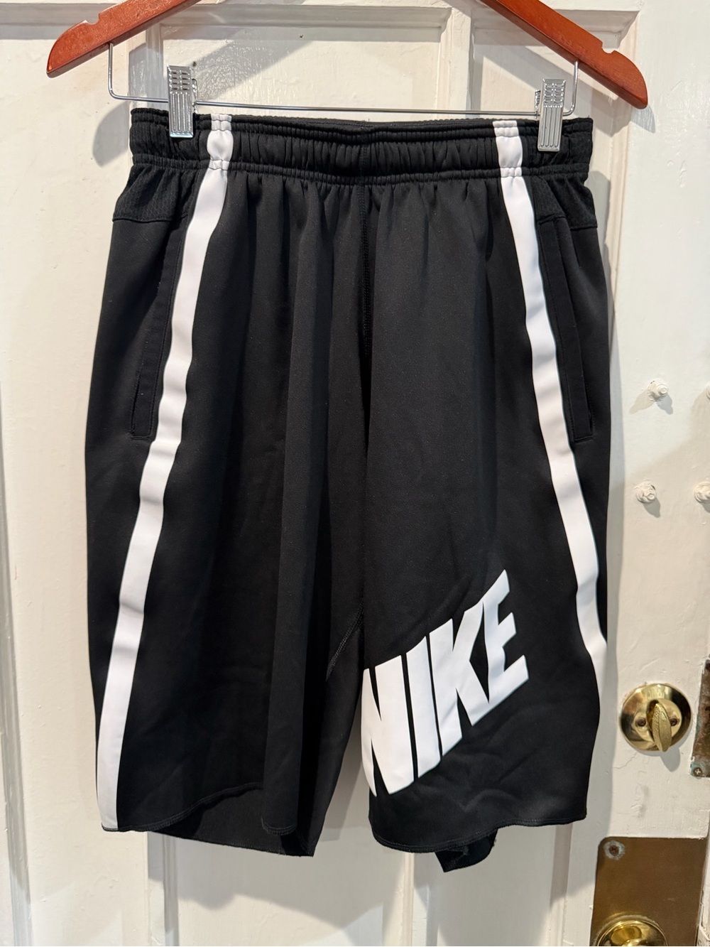 Nike Black Athletic Shorts with White Stripes and Logo